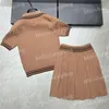 Faldas plisadas de punto para mujer Camisas polo 2 piezas Conjuntos de diseñador Letras de punto Camisetas Vestido corto Moda de dos piezas