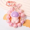 New Dreamy Macaron Colored Sitting Astronaut Keychain Pendant Colorful Bead Chain Luggage Pendant