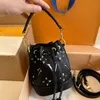 Seau en cuir de designer de qualité supérieure vintage maquillage à imprimé épaule mini sac à corps crossbody women