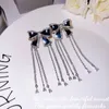 Foydjew Pendientes colgantes de circón con borla larga de lujo para mujer, pendientes colgantes de cristal con lazo exquisito, regalos de joyería para fiesta 240401