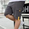 Short pour hommes grande taille Streetwear noir 2024 été coton poche latérale culotte mâle taille élastique bande décontracté Cargo hommes