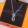 Collana con ciondolo a naso lungo di maiale in rame di lusso Collana con fibbia a naso lungo con ciondolo a forma di maiale in rame Collana di lusso leggera in argento 925 e coppia da donna con logo