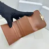 Haute Qualité Femme Petit Portefeuille Designer Derme Hommes Titulaire de la carte Embrayage de luxe Mini Flip Fold Coin Carte d'identité Portefeuilles Couleur Cuir Mode Mini sac à main avec boîte