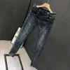 Mens Luxury 2023 Kore tarzı esneklik rahat kovboy sokak kıyafeti yırtık tasarımcı gündelik denim skinny jeans erkekler için 240323