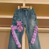 Kvinnors jeans broderade blommor flaer kvinnor vår 2024 retro långa byxor