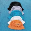 Cappello da secchiello in rafia di paglia Cappellino firmato per uomo Donna Baseb tutti i berretti Berretto Casquettes cappelli da pescatore secchi patchwork Estate di alta qualità
