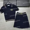 Faldas plisadas de punto para mujer Camisas polo 2 piezas Conjuntos de diseñador Letras de punto Camisetas Vestido corto Moda de dos piezas