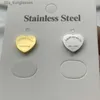 Pendientes de diseño T pendiente de corazón de oro mujer rosa Stud pareja bolsa de franela Acero inoxidable 10 mm de espesor Piercing joyería regalos mujer Accesorios al por mayor