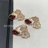 Designer charm High version V Gold Lucky Clover White Fritillaria Plum Blossom Ring Womens Light Luxury Van Precision Edition