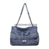 Bolsa de ombro versátil ins bolsa de grande capacidade para mulheres 2023 nova moda tote tamanho pequeno denim corrente crossbody h240401