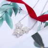 Collier en or à trois feuilles avec des fleurs pleines de diamants, chaîne de clavicule de luxe légère et élégante, chaîne de clavicule à cinq pétales de fleurs féminine et polyvalente