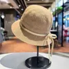 Celebrity Xiaoxiangfeng Tempérament élégant chapeau haut de gamme Femme / été coton et chanvre Chapeau de pêcheur respirant Version coréenne Bow Sun Visor Hat