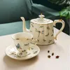 Tazze Piattini Retro European Bubble Tea Cup Cottura ad alta temperatura Modello di fiore in ceramica Caffè Delicato Teiera pratica per