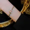 Bracelet de créateur de nez de cochon de marque de luxe Compteur de Hong Kong 18K haut de gamme micro incrusté de zircon ovale bracelet d'ouverture de nez de cochon bracelet simple et polyvalent