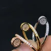 Luxus Damen und Männer Designer -Marke Ring 18k Gold plattiert Set mit Kristallwasser Diamantschmuck Charmante Perle Hochzeit Weihnachtsfeier Geschenk Accessoires