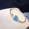 Bracciale di cuore di Designer Chopard Xiao Famiglia Naturale White Beimu Bracciale a cuore aperto per donne placcate con oro rosa 18k e braccialetto di cuore diamantato 2024