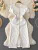 Sukienki imprezowe koreańskie eleganckie kobiety białe sukienkę 2024 Summer O-Neck krótki rękaw Elegancki szczupły imperium przednie podstępne kolano biuro