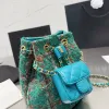 24ss Nowy francuski klasyczny designerski projekt plecak Tweed metalowa torba łańcuchowa modne damskie diamentowe ramiona Torba Bag