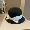 Chapeau de seau de créateur pour femmes printemps/été avec nœud à pois décoration lettre chapeau de paille classique en plein air chapeaux de plage élégants et mignons
