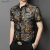 남성용 플러스 티 폴로 폴로 남성 자수 꽃 의류 여름 투명한 메쉬 셔츠 남성 중공 플로럴 클럽웨어 레이스 드레스 셔츠를 통해보세요 yq240401
