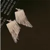 European and American style tassel earrings detachable snake bone chain line tassel earrings high-end feel fashion show magazine style personality trend AB68