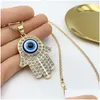 Pendant Necklaces In Bk Alloy Rhinestone Fatima Hand Pendant Necklace Turkish Blue Evil Eyes Diamond Set Sweater Chain Necklaces Jewel Dhb54