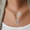 Pendant Necklaces New Fashion Double Leaf Womens Bohemian Simple Alloy Clavik Necklace Leaf Pendant Necklace Accessories Jewelry GiftsL2404