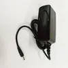 Et adaptateur d'alimentation pour projecteur Intelligent Tianchuang D05/D09, chargeur américain