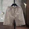 Heren shorts mode -label geborduurd vijf delige camouflage bedrukte casual broek, zomer snel drogende strandbroek
