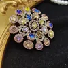 Brooches High Quality Light Luxury Fashion Vintage Gold-plated Colored Gemstones Inlaid With Flowers Hollow Design Women's Brooch Pins