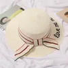 Summer Beach Sun Hat Womens szerokie czapki Kobiety wakacyjne wakacje w howeru