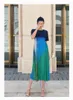 فساتين الحفلات التي تبيع Miyake Fold Abstract Print Print O-tech short sleeve a-liine dress in stock