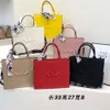 Bolsa de couro designer vende bolsas femininas de marca com 50% de desconto nova bolsa feminina portátil de ombro único crossbody