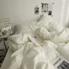 Set di biancheria da letto Copripiumino lenzuolo per dormitorio studentesco in cotone lavato doppio incantesimo tinta unita Tre set da 4 pezzi all'ingrosso