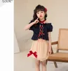 Filles d'été Bows vêtements de princesse ensembles enfants à lacets col à volants manches bouffantes hauts jupe élastique élastique 2 pièces tenues pour enfants de mode Z7461