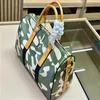 Äkta läder män mode stora handväska män mode axelväska kamouflage äkta läder canvas duffle påsar stora bagage väskor designer