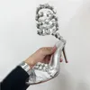 デザイナーrene caovilla stileetto Heels Sandalsマーゴットラップアラウンドクリスタル編集ドレスシューズレディーススリッパラインストーンスタッドシューズサンダル