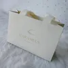Sacos de compras impressos personalizados joias que empacotam arte luxuosa do presente do saco de papel com seus próprios