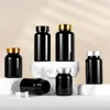 Lagringsflaskor 10 PC Black Tablet Packaging Bottle Container Packer Plastic Burkar med lock för matgodis