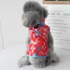 Abbigliamento per cani Anno cinese Vestiti Cheongsam Cat Pet Vest Tang Suit Yorkie Pomerania Schnauzer Barboncino Bichon Costume da cucciolo