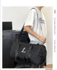 Top Quality New Men Duffle Bag Women Travel Bags Hand Luggage Travel Bags Men Pu Leather Handbags Large CrossBody Bags Totes 50cm
