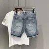 Pantaloncini di jeans da 22 anni Pantaloni casual stampati stile coreano estivo da uomo 240328