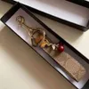 10a Schlüsselschüsse Lanyards Luxus Schlüsselbund Schöne winzige süße Kirschschlüsselring für Frauen Charme Baghalter Ornament Anhänger Accessoires 2024 Ketten