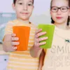 Tasses jetables Paies d'eau de couleur vive incomparable en tout-petit buvant des enfants fête des enfants réutilisables