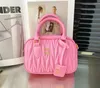 2024 Borsa a tracolla Miui moda Mattilas Bowling Borsa da donna errante di lusso Slant Body Cosmetics Borsa da donna in pelle Pochette in pelle