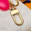 Keychains Lanyards Designer Keychain Luxury Bag Charm Heart Shaped Key Chain Fashion love Pendants Gold Keyring Car Ornament 2308048Z