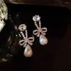 Boucles d'oreilles pendantes Style coréen, nœud papillon en cristal de luxe pour femmes et filles, perle en Zircon, accessoires de bijoux de mariage pour mariée