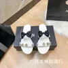 14% de réduction Chaussures de créateurs Xiaoxiangjia Bow Bottom Femmes Summer Flower Tête ronde pour vêtements chauds Pantoufles à talons plats