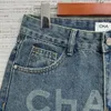 Chanei 24 Spring/Summer New Laser Burnt Flower Letter Blue Retro Old High midje denimshorts för kvinnor 509