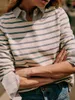 T-shirts pour femmes français rayé à manches longues T-shirt épaule bouton décoration printemps dames col rond t-shirt décontracté haut tout-Match